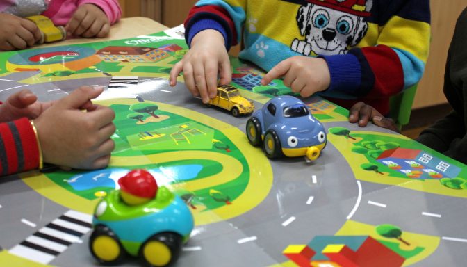 Children playing cars